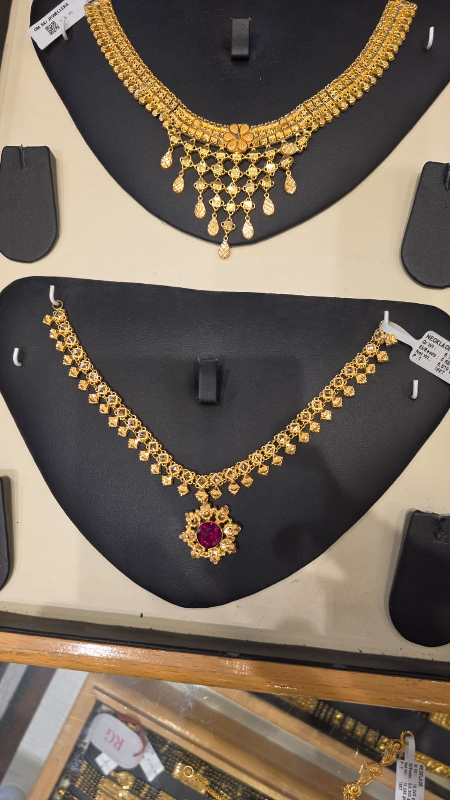 Gold necklace with pendant at Om Sai Jewellers Valpoi